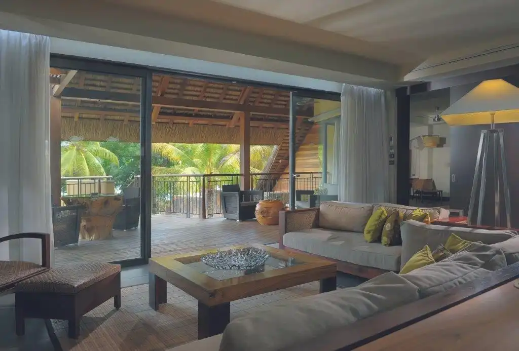 Elegant lounge looking out onto private patio @ Trou aux Biches - Mauritius