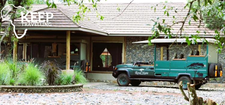 Royal Mara Safari Lodge safari vehicle parked outside the lodge entrance