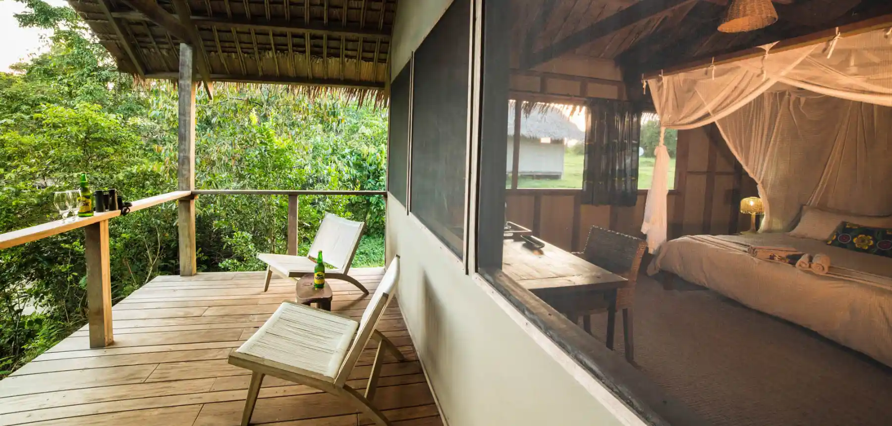 Rainforest lodge bedroom and private deck on a Republic of Congo safari