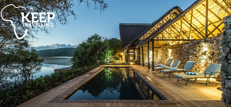 Swimming pool and lodge deck overlooking the river at Kariega Game Reserve